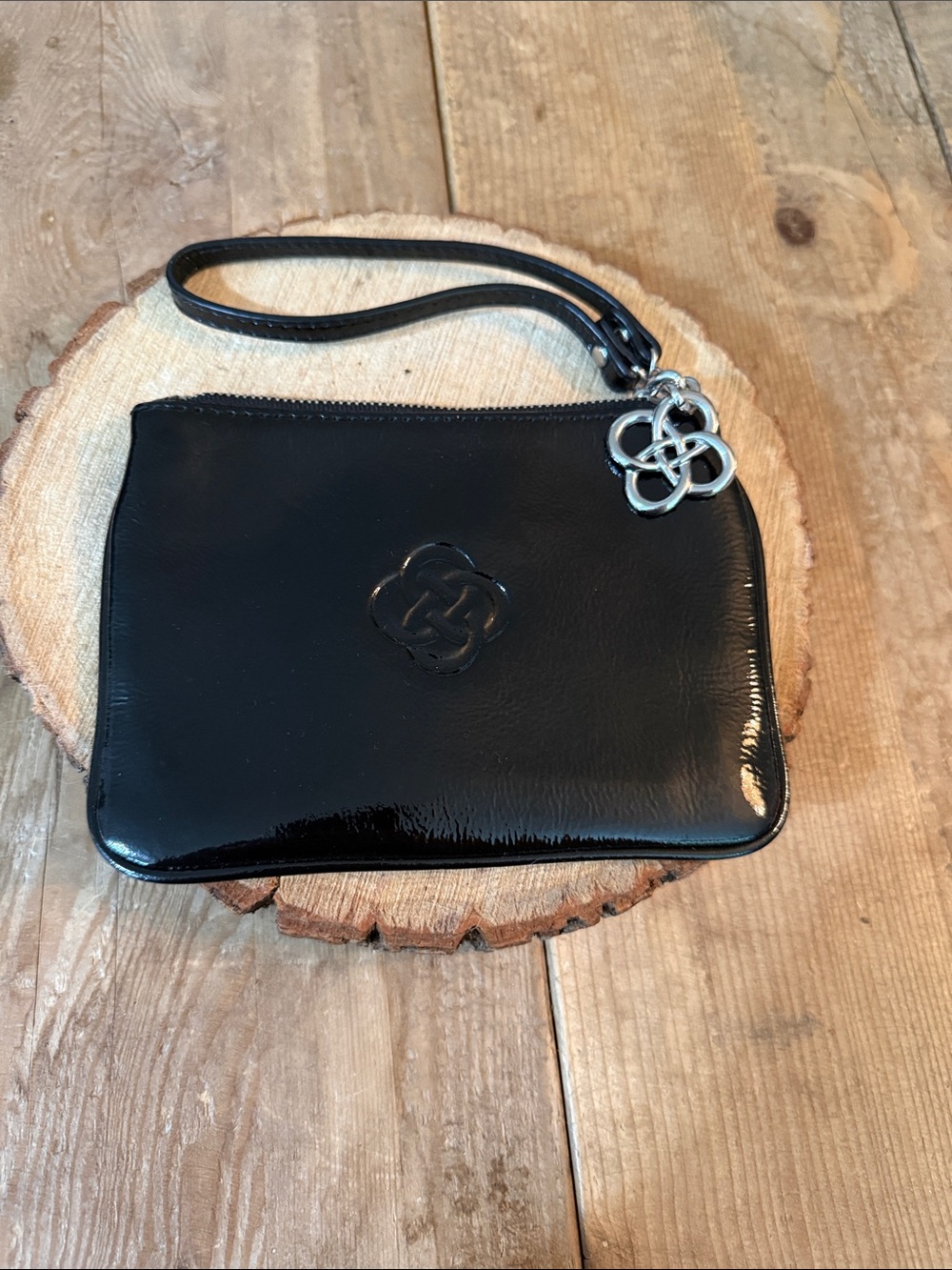 Stella & Dot Black Patent Leather Wristlet with Silver Logo Charm